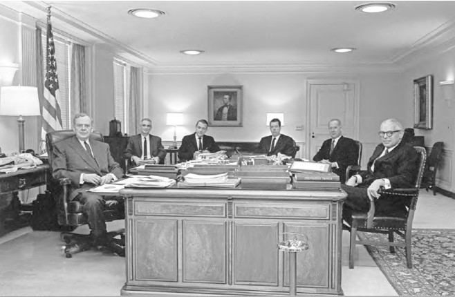 Secretary Clifford &#40;far left&#41; and his &#8220;8&#58;30 Group&#8221;&#8212;the trusted advisors he met with daily. From left