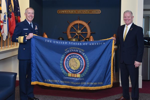 Privileged to present the Commemorative Flag to Vice Adm. Kevin Lunday, U.S.C.G. Atlantic Area comma