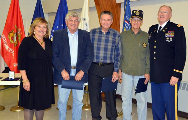 L-R&#58; First Lady Ann LePage poses with the three Belanger Brothers who served in the Vietnam War. The