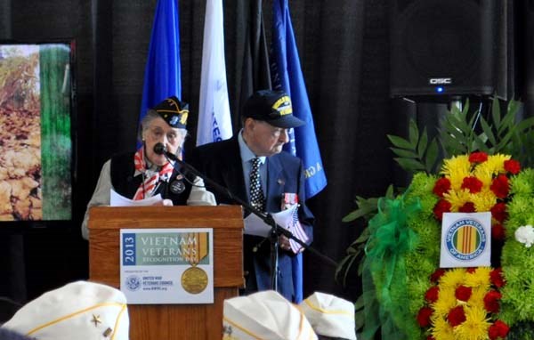 Volunteers read the names of the New York fallen servicemembers of the Vietnam War during a ceremony