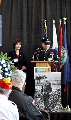 Volunteers read the names of the New York fallen servicemembers of the Vietnam War during a ceremony