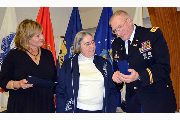 State of Maine Gold Star Honorable Service Medal being awarded to widow, Dorothy Hopkins, for her hu