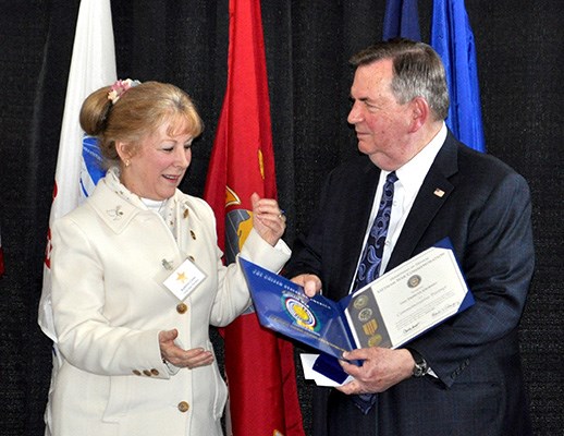 Our latest Commemorative Partners receive their flags and certificates during a ceremony at the New 