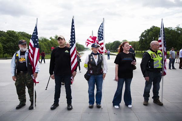 Members of the Patriot Guard Riders greet Vietnam veterans from four Nebraska Vietnam flights.