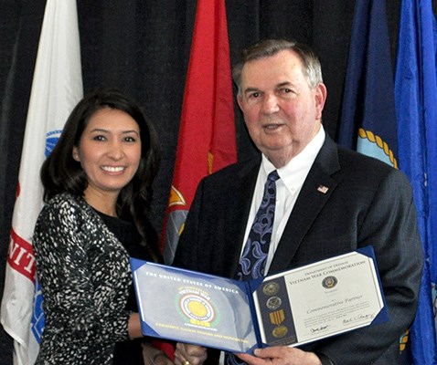 Our latest Commemorative Partners receive their flags and certificates during a ceremony at the New 