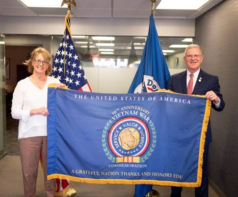 VWC Director, Retired U.S. Army Major General Peter M. Aylward, presented the Commemorative flag to 