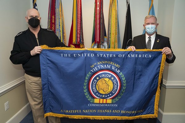 Navy Adm. Christopher W. Grady, Vice Chairman of the Joint Chiefs of Staff with director Peter M. Ay