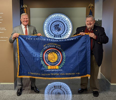 Flag presentation to VVA National President Jack McManus.