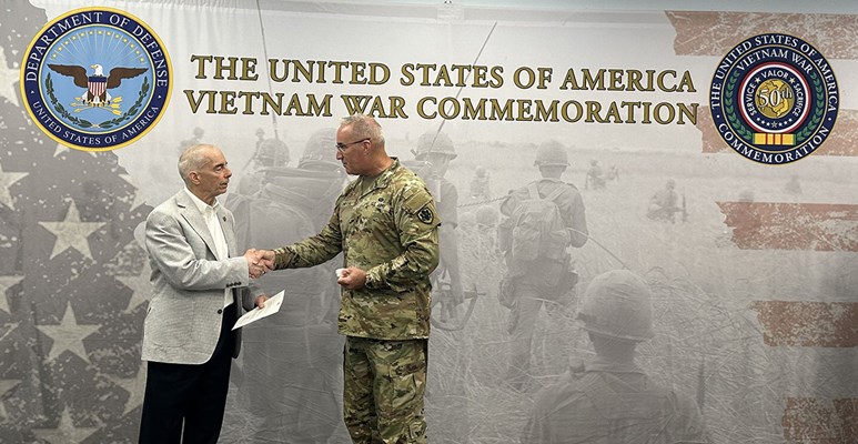 Vietnam veteran Larry Neff was presented a coin by VWC Director Maj. Gen. Edward J. Chrystal, Jr.