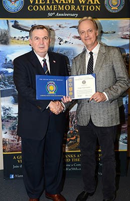 Singer and songwriter Chris Van Cleave visited the Vietnam War Commemoration and received a Certific