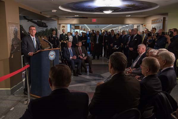 Secretary of Defense Ash Carter attends a Vietnam War hallway dedication ceremony.