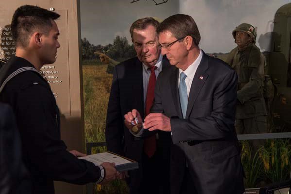 Secretary of Defense Ash Carter attends a Vietnam War hallway dedication ceremony.