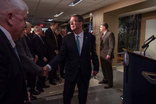 Secretary of Defense Ash Carter attends a Vietnam War hallway dedication ceremony.