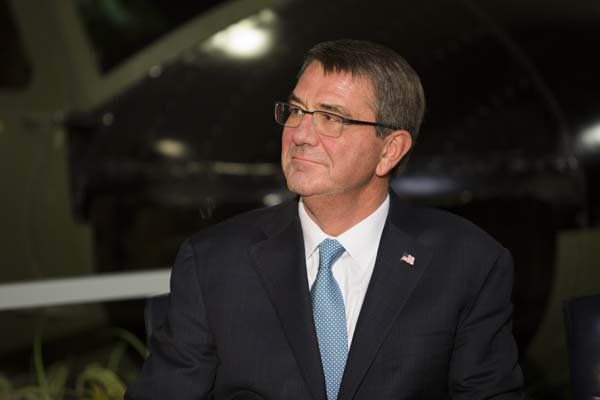 Secretary of Defense Ash Carter attends a Vietnam War hallway dedication ceremony.