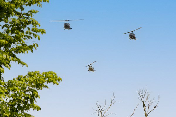 Vietnam_War_Period_Huey_Flyover_During_Opening_Ceremony