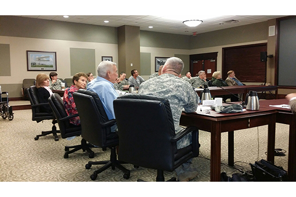 Lt. Col. Clark Welch &#40;U.S. Army retired, center&#41; talks in a community forum at Fort Leavenworth, Kan