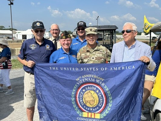 VVA members, CDR Al Lipphardt, Col. Tom, former POW &#38; VV David Harker with the Comm. Flag.