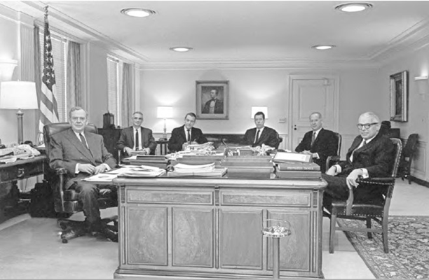 Secretary Clifford &#40;far left&#41; and his &#8220;8&#58;30 Group&#8221;&#8212;the trusted advisors he met with daily. From left