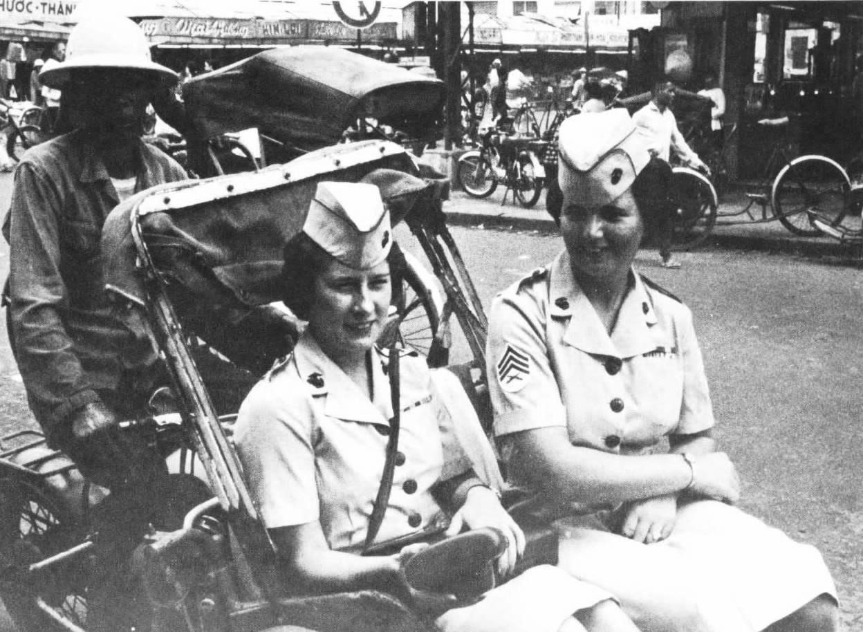 Between 1967 and 1973, 36 women Marines served in South Vietnam. Pictured here, Captain Elaine E. Filkins (left) and Sergeant Doris Denton (right) see Saigon during some rare off-time, circa 1970.