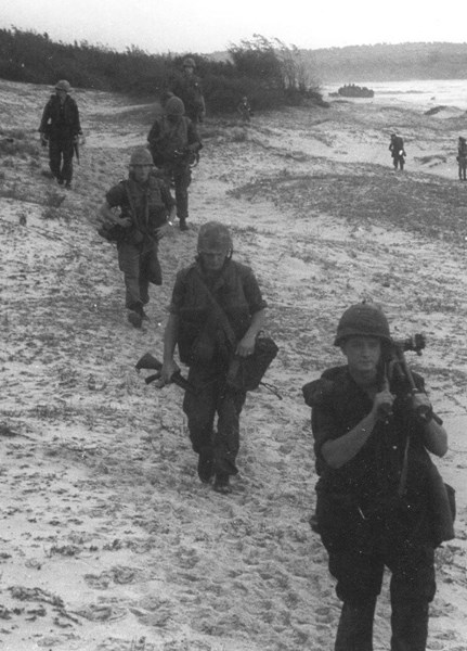 The 26th Marine Regiment moves along the beach on the Batangan Peninsula during Operation BOLD MARINER, January 1969.