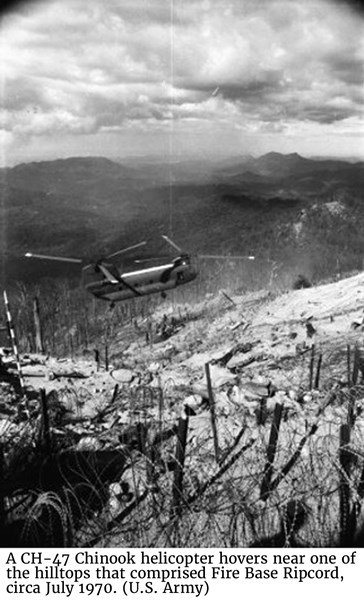 A CH-47 Chinook helicopter hovers near one of the hilltops that comprised Fire Base Ripcord, circa July 1970. (U.S. Army)