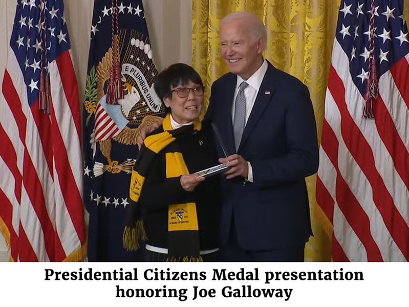 Photo of President Biden presenting the Presidential Citizens Medal honoring Joe Galloway.