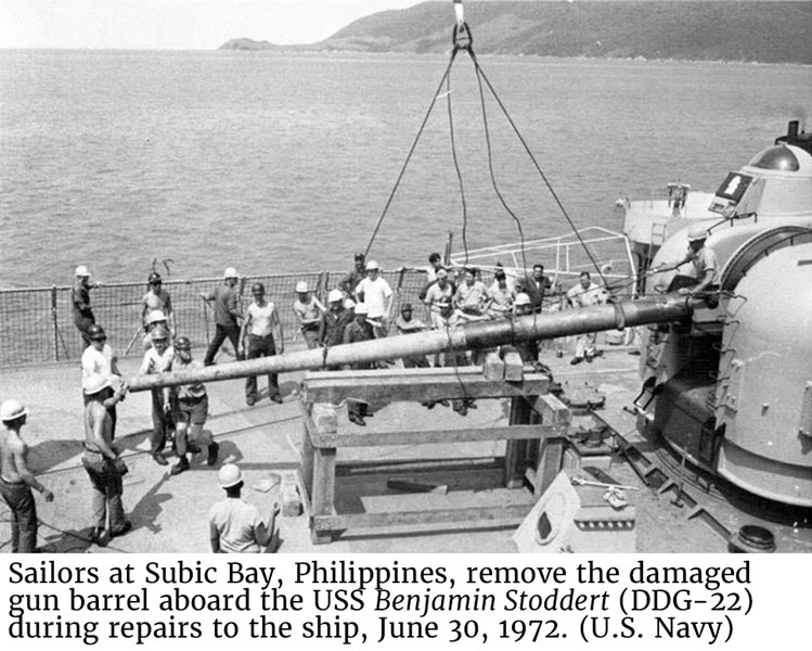 Sailors at Subic Bay, Philippines, remove the damaged gun barrel aboard the USS Benjamin Stoddert (DDG-22) during repairs to the ship, June 30, 1972. (U.S. Navy)