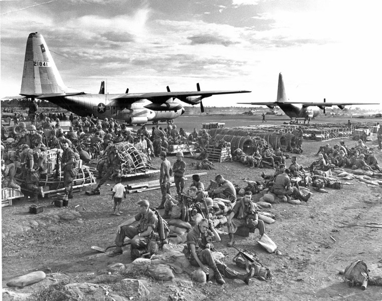 U.S. soldiers unload from U.S. Air Force C-130s at Dau Tien in preparation for Operation CEDAR FALLS, January 7, 1967