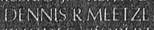 Engraved name on The Wall of Specialist Four Dennis R. Meetze, U.S. Army