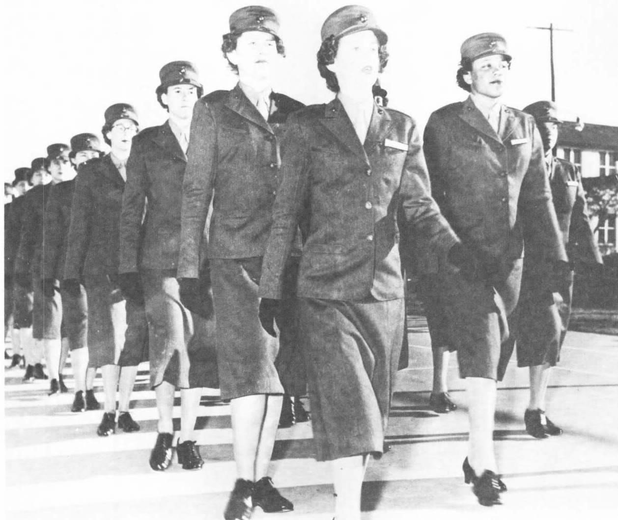 Private Annie L. Grimes, the third black woman to enlist in the Marine Corps, with her recruit platoon at Parris Island, South Carolina, 1950. Grimes went on to become the first black woman officer in the Corps.