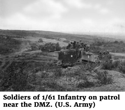 Photo of soldiers of 1/61 Infantry on patrol near the DMZ. (U.S. Army)