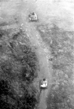 Two Knocked-out PT-76 Tanks near Lang Vei